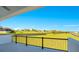 Beautiful view of the community landscape from the outdoor living space at 200 Snowy Orchid Way, Lake Alfred, FL 33850