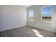 Bedroom with luxury vinyl tile and natural light from two windows at 200 Snowy Orchid Way, Lake Alfred, FL 33850
