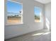 Bright, airy bedroom showcasing beautiful luxury vinyl tile flooring at 200 Snowy Orchid Way, Lake Alfred, FL 33850