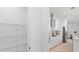 Walk-in pantry area next to the kitchen featuring wire shelving for optimal storage solutions at 200 Snowy Orchid Way, Lake Alfred, FL 33850