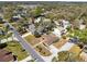 Expansive aerial view showing the property located in a mature, residential neighborhood surrounded by trees and foliage at 2101 Lake Francis Dr, Apopka, FL 32712