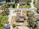 Aerial view of the neighborhood showing a close proximity to other homes, streets, and foliage at 2101 Lake Francis Dr, Apopka, FL 32712