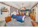 Primary bedroom featuring a bed, carpet, natural light, and wooden furniture at 2326 Wintermere Pointe Dr, Winter Garden, FL 34787