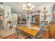 Bright dining room with a chandelier, perfect for Gathering gatherings at 2326 Wintermere Pointe Dr, Winter Garden, FL 34787