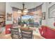 Bright dining room with a table set for a meal and decorative items at 2326 Wintermere Pointe Dr, Winter Garden, FL 34787