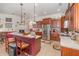 Spacious kitchen with stainless steel appliances and a breakfast bar at 2326 Wintermere Pointe Dr, Winter Garden, FL 34787