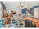 Large living room featuring vaulted ceilings, ceiling fans, and neutral carpeting at 2326 Wintermere Pointe Dr, Winter Garden, FL 34787
