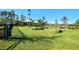 Well-maintained community dog park with ample green space, seating, and play features for residents and their furry friends at 2949 Marlberry Ln, Clermont, FL 34714