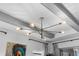 Modern ceiling light fixture with an open floor plan view at 2949 Marlberry Ln, Clermont, FL 34714
