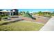 A vibrant community playground area with a slide, swings, and other play equipment for children at 2949 Marlberry Ln, Clermont, FL 34714