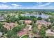 Bird's-eye view of the property in a community near a lake at 3414 Cocard Ct, Windermere, FL 34786