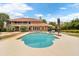 A large in-ground pool and patio area are the focal point of this backyard at 3414 Cocard Ct, Windermere, FL 34786