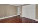 Spacious bedroom featuring hardwood floors and a large closet at 3414 Cocard Ct, Windermere, FL 34786