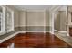 Large living room area featuring hardwood floors and neutral colored walls at 3414 Cocard Ct, Windermere, FL 34786