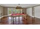 Game room with a pool table, wood floors and glass paned doors that lead to a balcony at 3414 Cocard Ct, Windermere, FL 34786