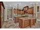 Gourmet kitchen with granite countertops, and custom wood cabinets at 3414 Cocard Ct, Windermere, FL 34786