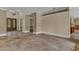 Spacious and bright living room features neutral colors and stone tile floors throughout at 3414 Cocard Ct, Windermere, FL 34786