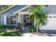 Charming home featuring a welcoming front entrance with a well-manicured garden and a lovely white door at 418 S Summerlin Ave, Sanford, FL 32771