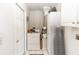 Functional laundry room with washer, dryer, and ample storage space at 418 S Summerlin Ave, Sanford, FL 32771