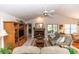 Spacious living room with vaulted ceilings, wood burning fireplace and comfortable seating area at 418 S Summerlin Ave, Sanford, FL 32771