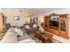 Comfortable living room features a large entertainment center and neutral decor at 418 S Summerlin Ave, Sanford, FL 32771