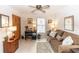 Versatile room with sofa, closet, desk, ceiling fan, and natural light at 418 S Summerlin Ave, Sanford, FL 32771