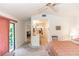 Spacious main bedroom with access to patio, walk-in closet, and en-suite bathroom at 418 S Summerlin Ave, Sanford, FL 32771