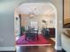 Open dining room with view to kitchen and outdoor area at 434 E Harding St, Orlando, FL 32806