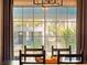 Bright and cozy dining room with large pane windows at 434 E Harding St, Orlando, FL 32806