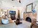 Cozy living room with a decorative fireplace, and stylish decor at 434 E Harding St, Orlando, FL 32806