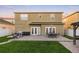 The backyard features a patio with dining and lounging areas, providing a perfect space for outdoor living at 5278 Walnut Ridge Dr, Orlando, FL 32829