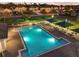 Community pool with shaded seating offers residents a relaxing spot to enjoy the sunshine at 5278 Walnut Ridge Dr, Orlando, FL 32829