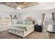 Beautiful main bedroom with tray ceiling, fan, and light neutral color palette for a relaxing space at 5278 Walnut Ridge Dr, Orlando, FL 32829