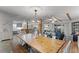 Open-concept space showcasing the dining area connected to the kitchen and living area at 53 Fore Dr, New Smyrna Beach, FL 32168