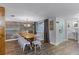 Stylish dining area with a rustic wood table and decorative accents at 53 Fore Dr, New Smyrna Beach, FL 32168