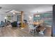 Open-concept living space with exposed beams, shiplap accent wall, and stylish decor at 53 Fore Dr, New Smyrna Beach, FL 32168