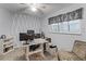 Dedicated office space with a desk, computer, and printer that offers an ideal work-from-home environment at 53 Fore Dr, New Smyrna Beach, FL 32168
