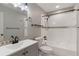 Bathroom features a vanity, toilet, and shower/tub combination with updated fixtures at 655 E Lake View Rd, Lake Alfred, FL 33850