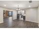 Inviting living space leading into a modern kitchen and cozy fireplace at 655 E Lake View Rd, Lake Alfred, FL 33850
