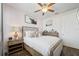 Charming bedroom featuring a comfortable bed, tasteful decor, and warm lighting at 7702 Fairfax Dr, Kissimmee, FL 34747