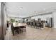 Spacious open-concept floor plan combines the kitchen, dining, and living area, perfect for entertaining at 7702 Fairfax Dr, Kissimmee, FL 34747