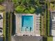 Aerial view of the backyard pool, patio and landscaping at 7702 Fairfax Dr, Kissimmee, FL 34747