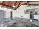 Bright, airy living area with wood-beam ceiling and marbled tile floors, connecting seamlessly with the kitchen at 812 2Nd St, Altamonte Springs, FL 32701