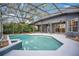 A stunning, screened pool with a spa sits in the backyard, offering the ultimate relaxation at 827 Royalwood Ln, Oviedo, FL 32765