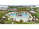Aerial view showcasing a luxurious resort-style pool with ample lounging space at 932 Kylee Aly, Winter Garden, FL 34787