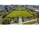 Well-maintained green spaces surrounded by beautiful homes in a Primary-planned community at 932 Kylee Aly, Winter Garden, FL 34787