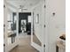 Bright home gym/office space with desk, treadmill, and contemporary design at 932 Kylee Aly, Winter Garden, FL 34787