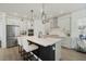 Beautiful kitchen with a spacious center island, stainless steel appliances, and modern finishes at 932 Kylee Aly, Winter Garden, FL 34787