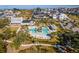 Community pool with palm trees, a pool house and plenty of lounge seating in a beautiful neighborhood at 932 Kylee Aly, Winter Garden, FL 34787
