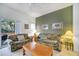 Inviting living room with comfortable seating and lots of natural light at 1027 Park Ridge Cir, Kissimmee, FL 34746